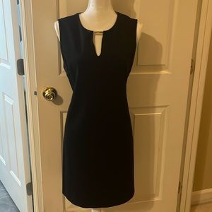 Black sleeveless knit dress